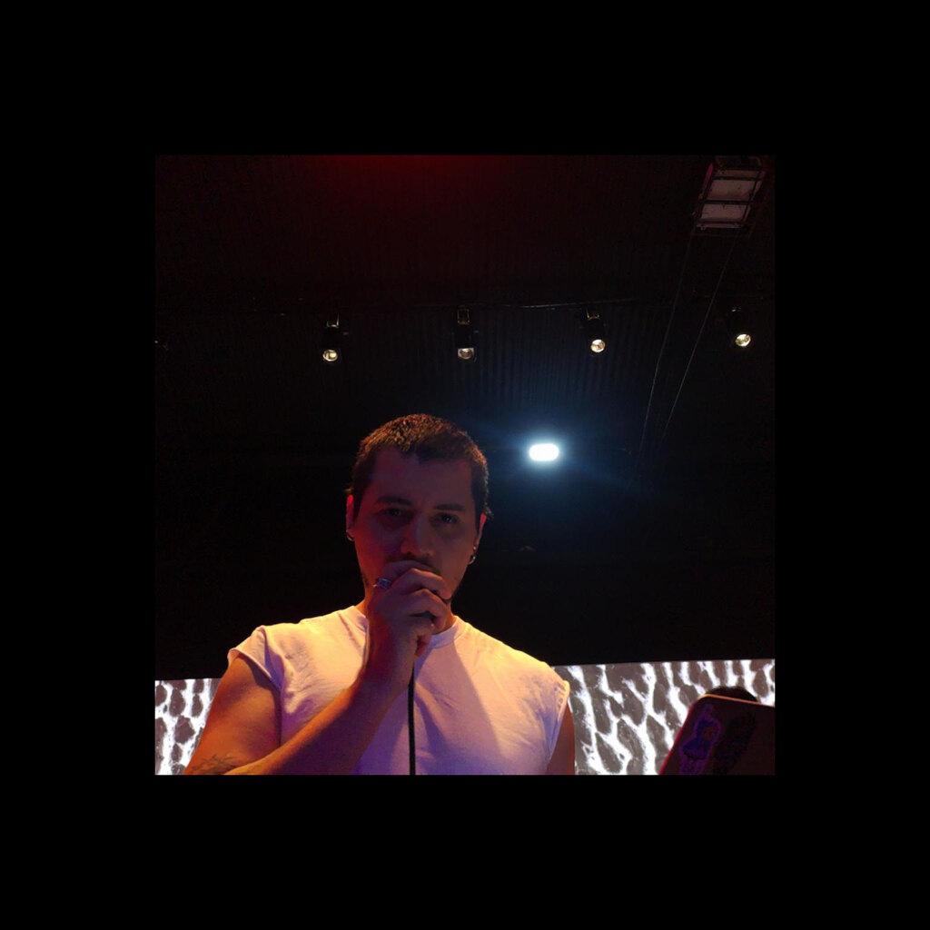dd.moon performing with a microphone